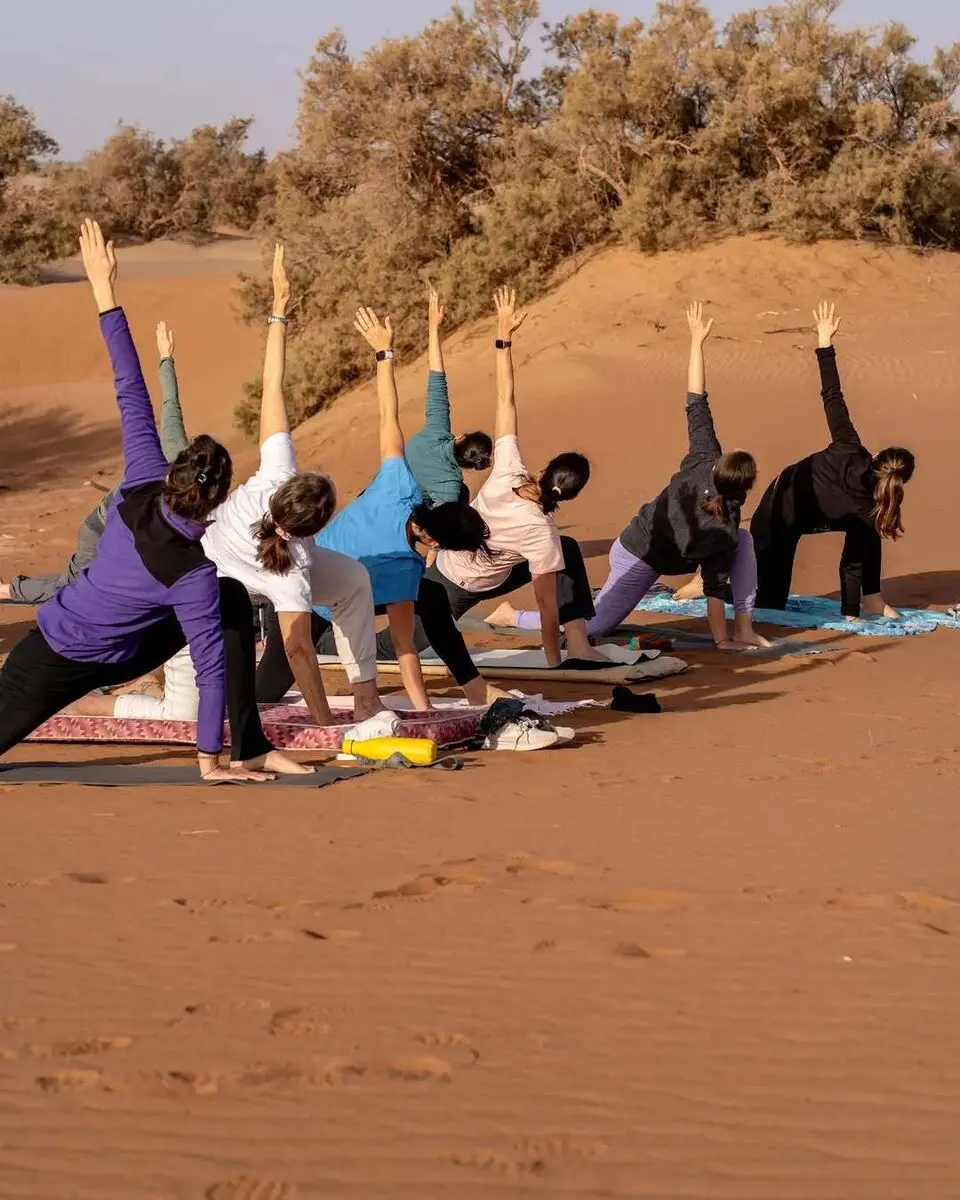 Desert yoga Mhamid El Ghizlane Sahara Morocco